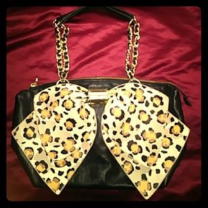 Betsey Johnson black purse with chettah print bow